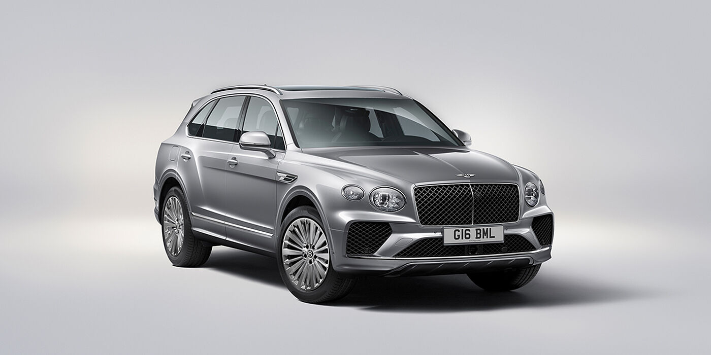 Bentley Paris Seine Bentley Bentayga luxury SUV front three quarter view in Moonbeam paint with matrix grille and 21″ 5 spoke painted wheels