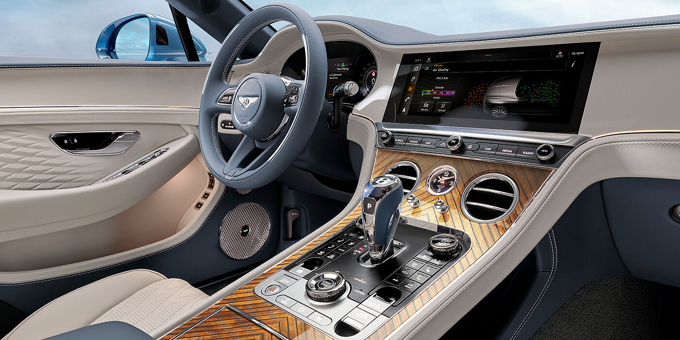 Bentley Paris Seine New Bentley Continental GTC Azure convertible interior front cabin view with Linen and Brunel hides and Piano Linen by Mulliner veneer featuring centre console and centre MMI screen