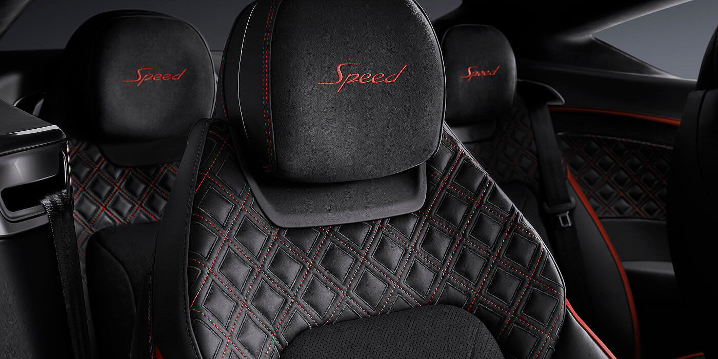 Bentley Paris Seine Bentley Continental GT Speed coupe seat close up in Beluga black and Hotspur red hide