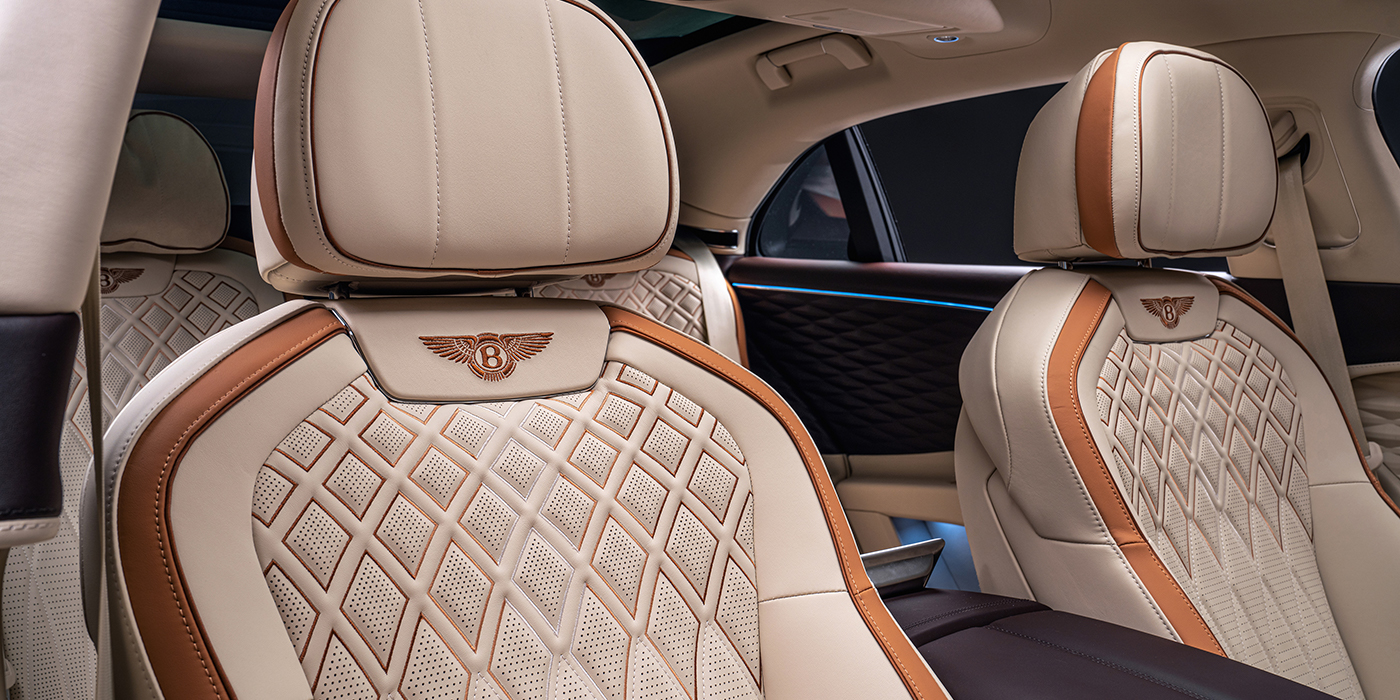 Bentley Paris Seine Bentley Flying Spur Odyssean sedan rear seat detail with Diamond quilting and Linen and Burnt Oak hides