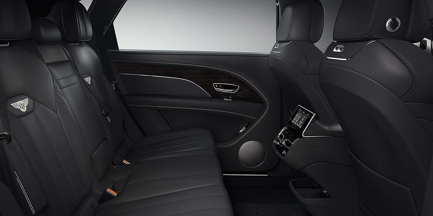 Bentley Paris Seine Bentley Bentayga EWB SUV rear interior in Beluga black leather