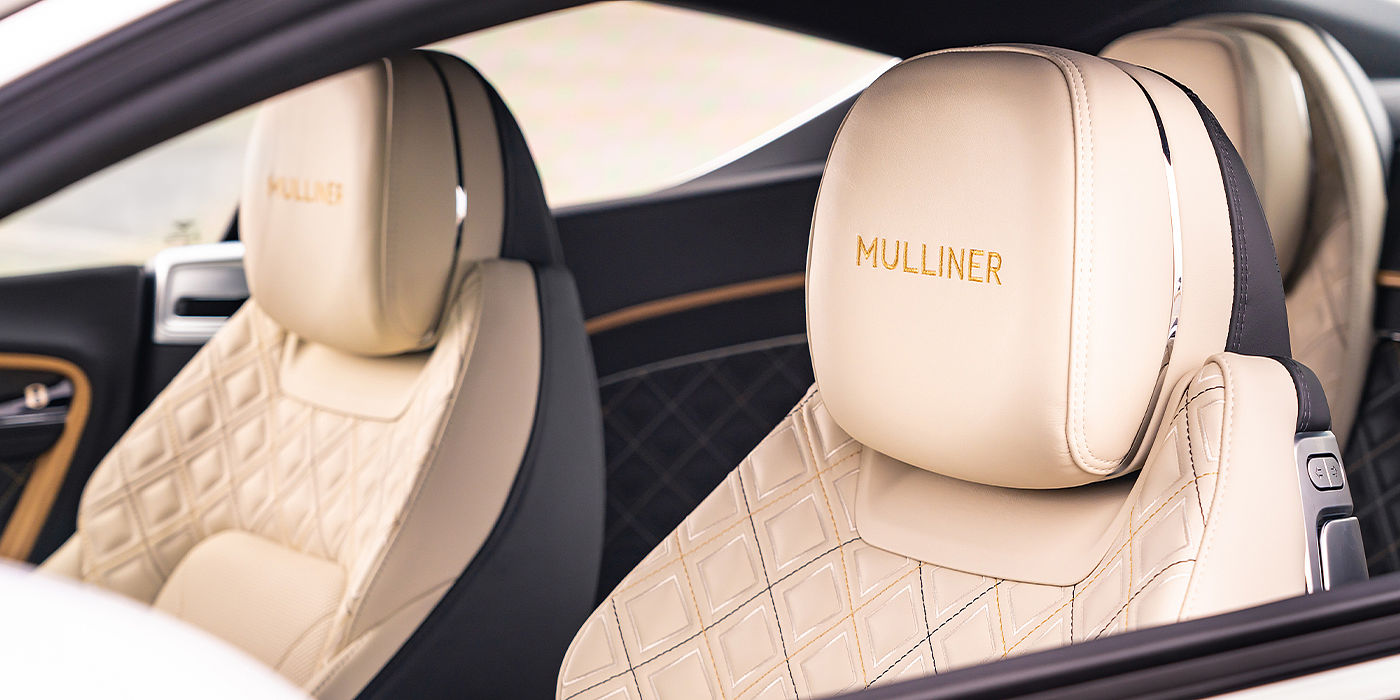 Bentley Paris Seine Bentley Continental GT Mulliner coupe seat detail in Beluga black and Linen hide