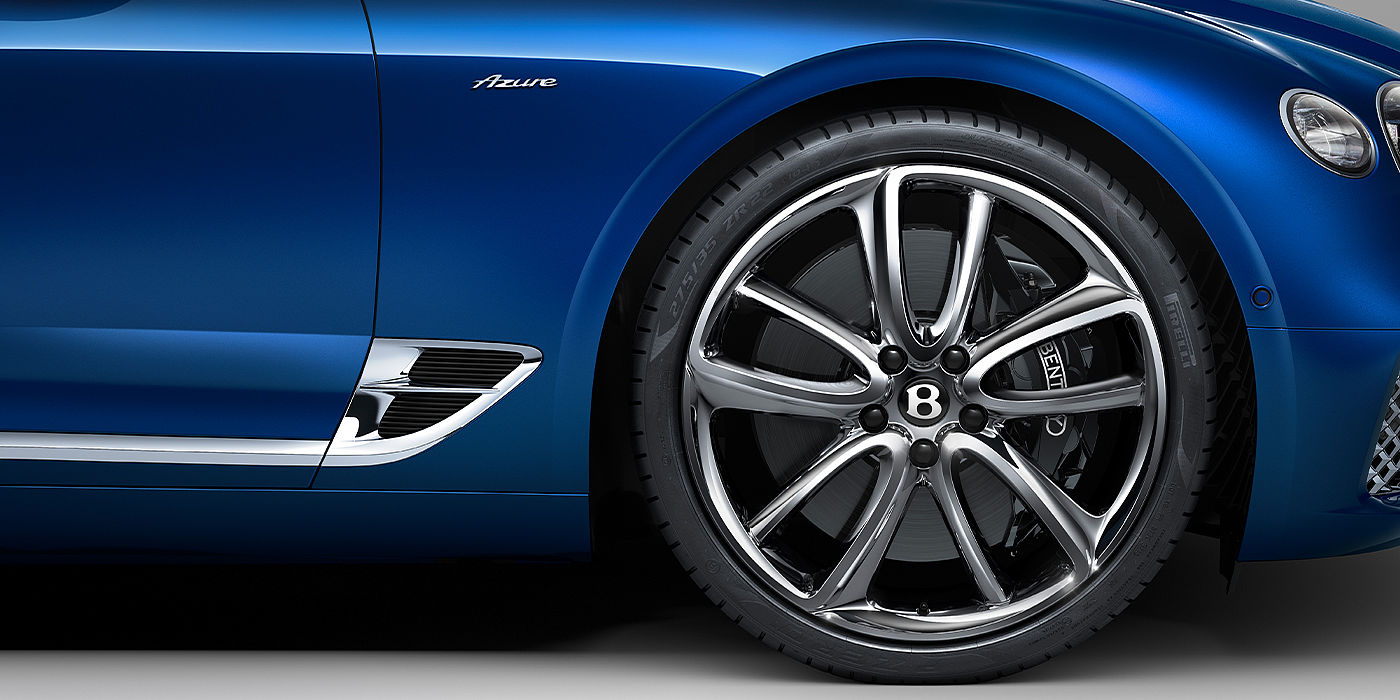 Bentley Paris Seine Bentley Continental GTC Azure convertible in Sequin Blue paint side profile with Azure badge close up