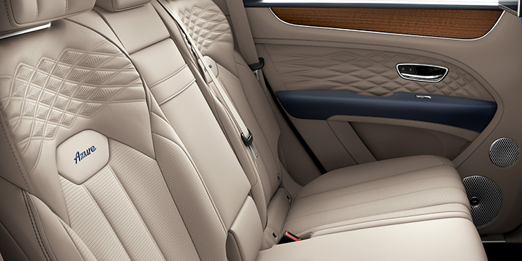 Bentley Paris Seine Bentley Bentayga Azure SUV rear interior in Portland and Imperial Blue hides and seat stitching featuring Azure seat emblem