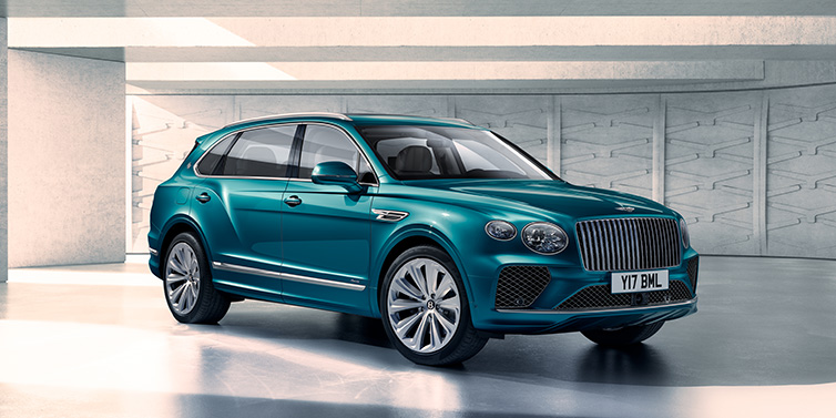 Bentley Paris Seine Bentley Bentayga Extended Wheelbase Azure SUV front three quarter in Topaz blue paint colour with a grey background