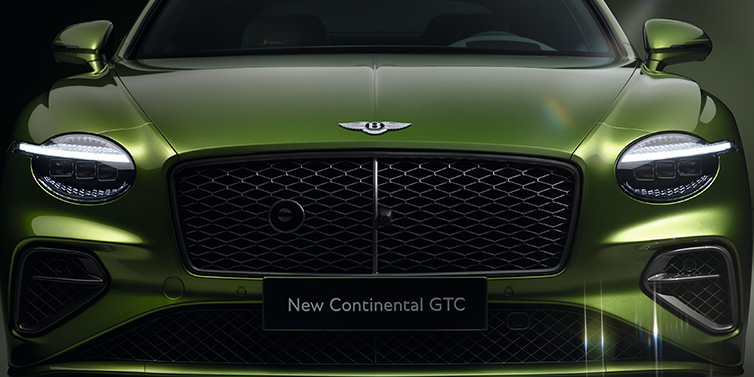 Bentley Paris Seine Bentley Continental GTC Speed convertible front bonnet detail in Tourmaline Green paint showing new light design