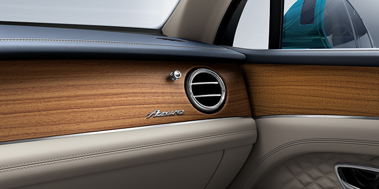 Bentley Paris Seine Bentley Bentayga Extended Wheelbase Azure front dash showing Open Pore Koa veneer surrounded by Portland and Imperial Blue hides