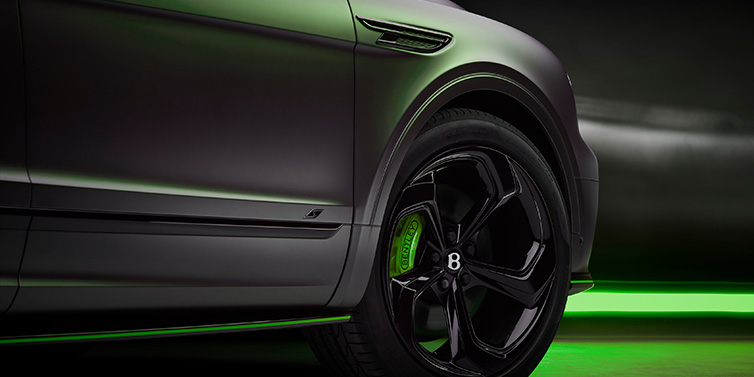 Bentley Paris Seine Bentley Bentayga S Black Edition SUV exterior wheel detail with Cyber Green brakes with Anthracite Satin paint