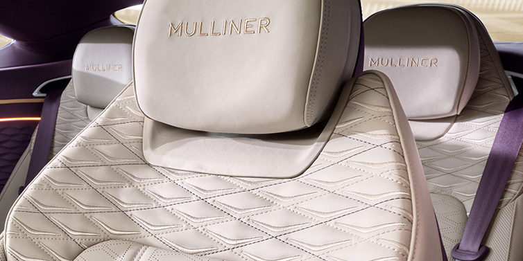 Bentley Paris Seine Bentley Continental GT Mulliner coupe seat detail in Linen leather with Mulliner Diamond in Diamond quilting and Mulliner embroidered seat emblem